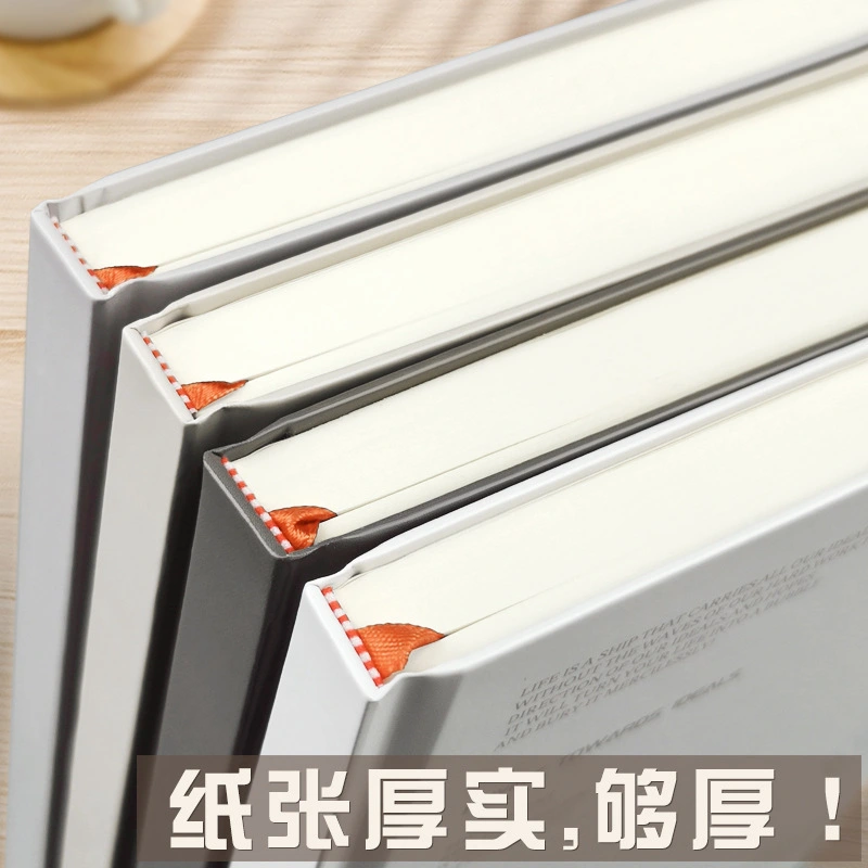 Writing paper inside the hardcover business notebook
